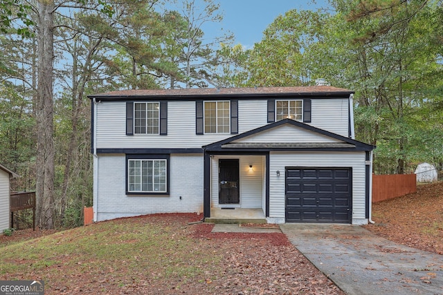 front of property with a garage