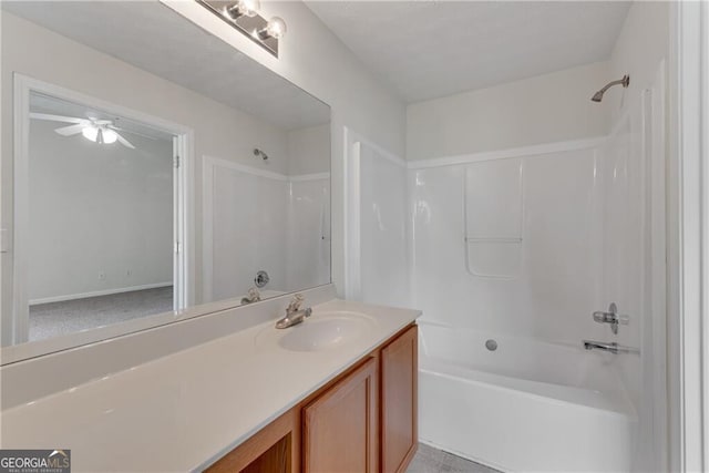 bathroom featuring shower / bathing tub combination and vanity