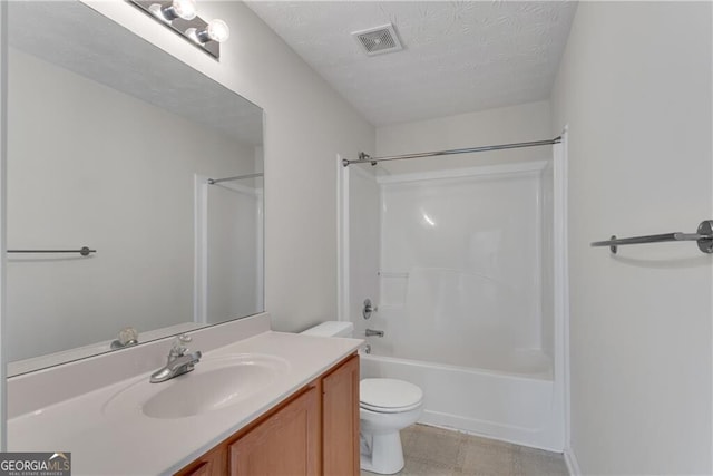 bathroom with visible vents, toilet, a textured ceiling, shower / bathing tub combination, and vanity