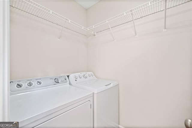 washroom featuring separate washer and dryer