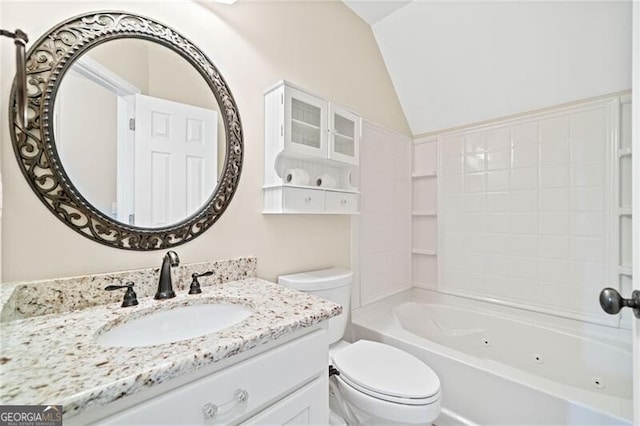 full bathroom featuring shower / bath combination, lofted ceiling, toilet, and vanity