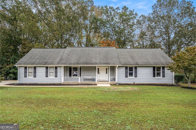 single story home featuring a front lawn and a porch