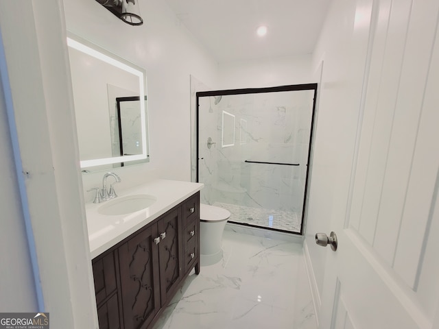 bathroom featuring walk in shower, vanity, and toilet