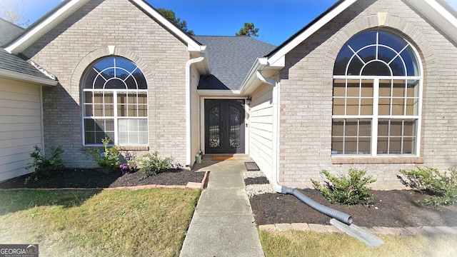 entrance to property featuring french doors