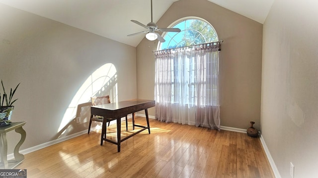 office space with vaulted ceiling, light hardwood / wood-style flooring, and ceiling fan