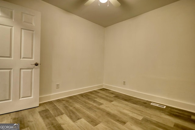 unfurnished room featuring light hardwood / wood-style floors and ceiling fan