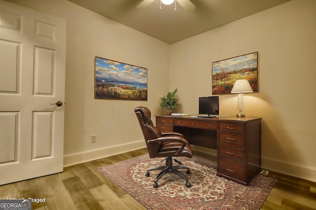 office featuring ceiling fan and light hardwood / wood-style floors