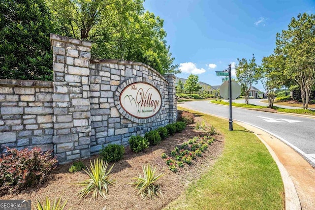 view of community sign