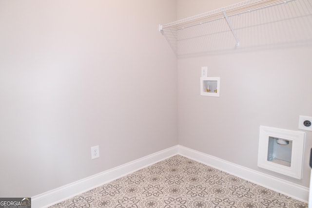 laundry area featuring light tile patterned flooring, hookup for a washing machine, and electric dryer hookup