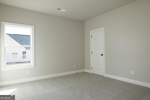 view of carpeted spare room