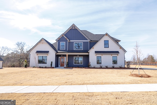 view of front of home with a front lawn