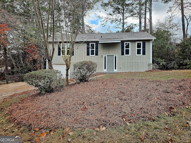 view of front of home with a garage