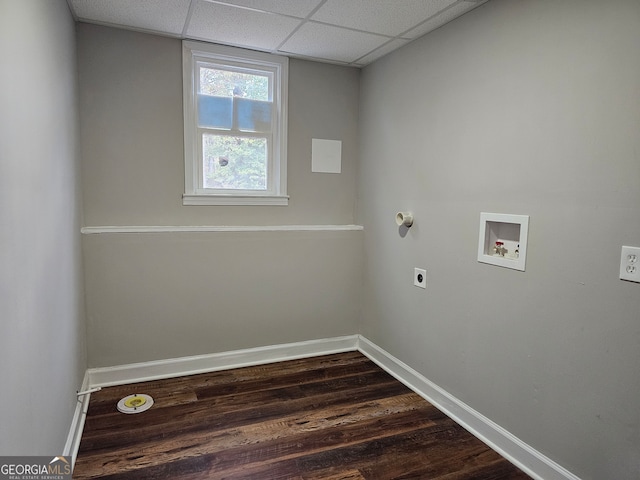 washroom with dark hardwood / wood-style flooring, electric dryer hookup, and hookup for a washing machine