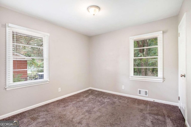 empty room with carpet floors