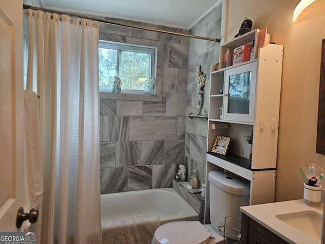 full bathroom featuring vanity, toilet, and shower / tub combo