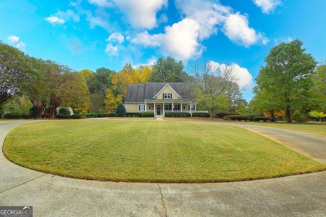 view of front of home with a front lawn