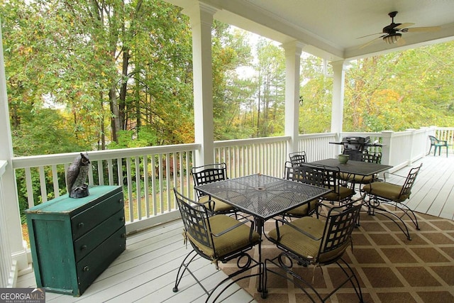 wooden terrace with ceiling fan