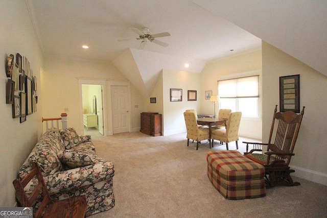 sitting room featuring light colored carpet, ceiling fan, and vaulted ceiling