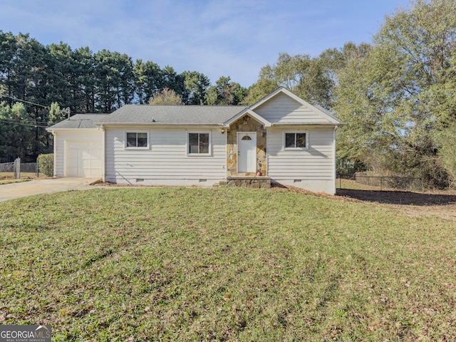 ranch-style house with a garage and a front yard