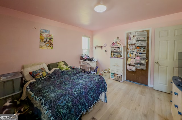 bedroom featuring light hardwood / wood-style flooring