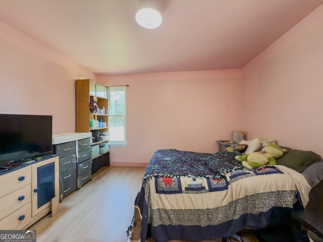 bedroom featuring light hardwood / wood-style flooring