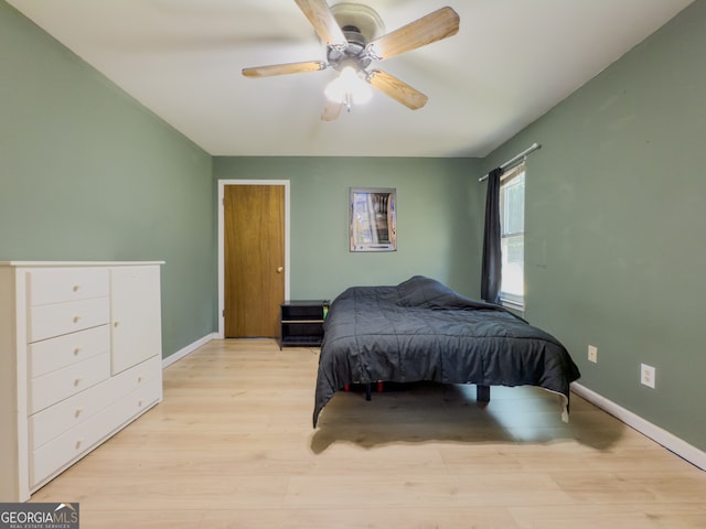 bedroom featuring ceiling fan and light wood-type flooring