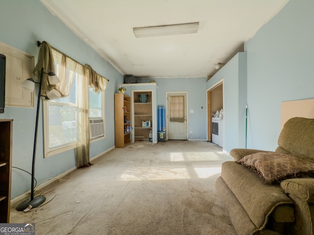 interior space featuring washer / dryer and light carpet