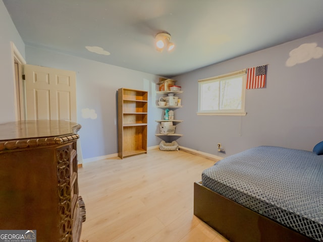 bedroom featuring hardwood / wood-style floors