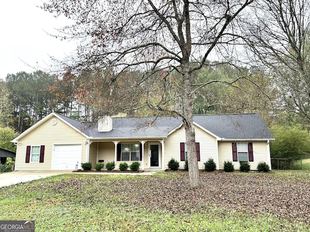 ranch-style home featuring a garage and a porch