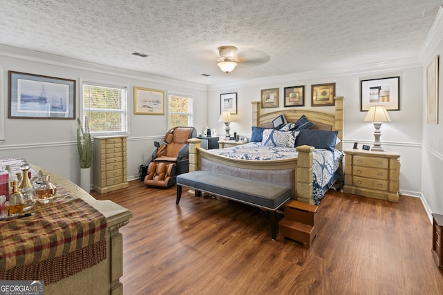 bedroom featuring ceiling fan, dark hardwood / wood-style floors, a textured ceiling, and ornamental molding