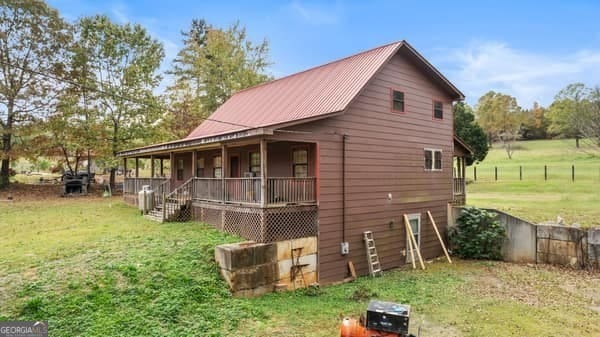 view of home's exterior featuring a lawn