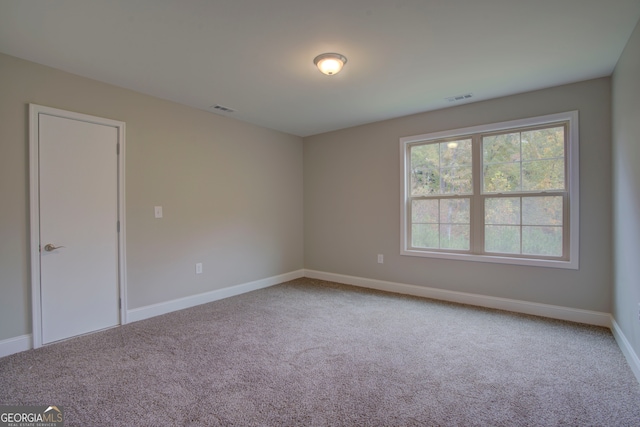 view of carpeted spare room