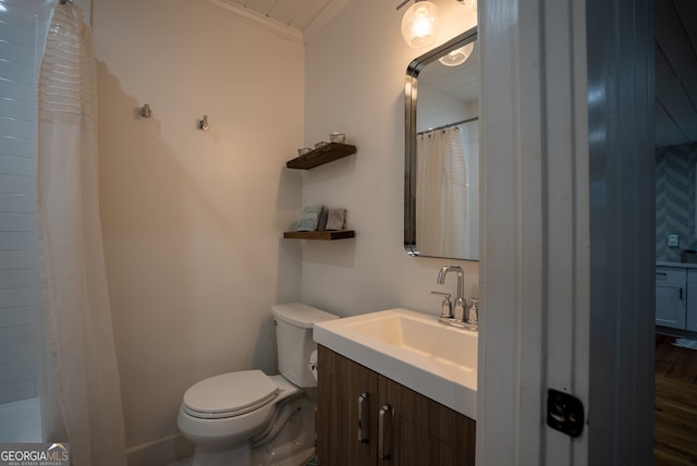 bathroom featuring crown molding, walk in shower, vanity, hardwood / wood-style floors, and toilet