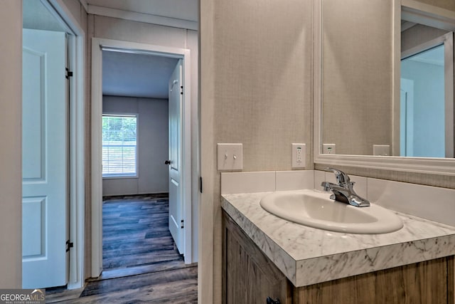 bathroom featuring vanity and hardwood / wood-style floors