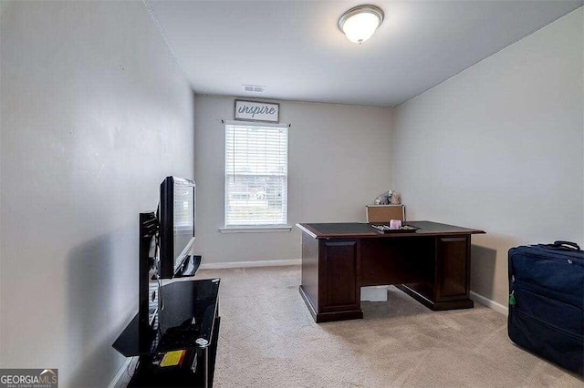 office space with light colored carpet