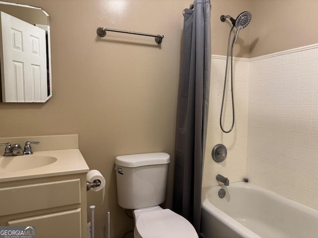 full bathroom featuring vanity, toilet, and shower / bathtub combination with curtain