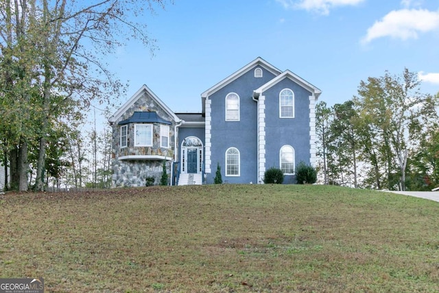 view of front property with a front yard