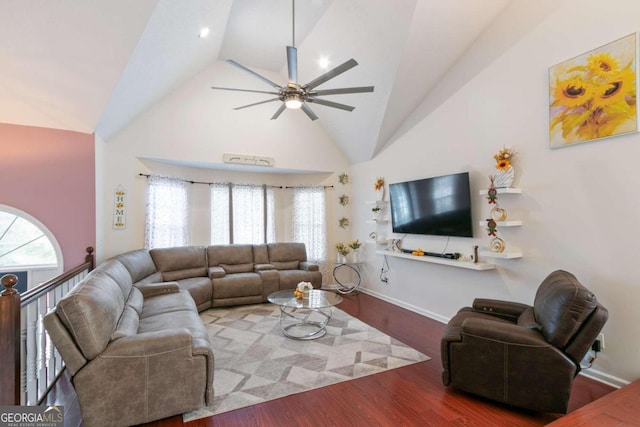 living room featuring hardwood / wood-style floors, ceiling fan, plenty of natural light, and high vaulted ceiling