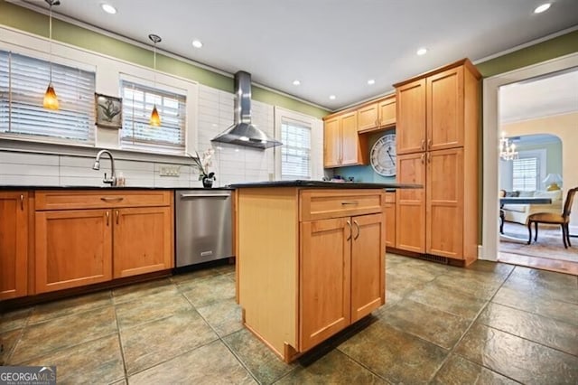 kitchen with pendant lighting, wall chimney range hood, stainless steel dishwasher, and a healthy amount of sunlight