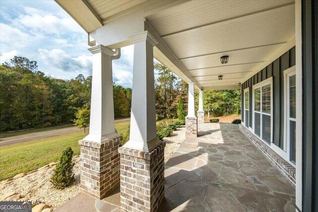 view of patio featuring a porch