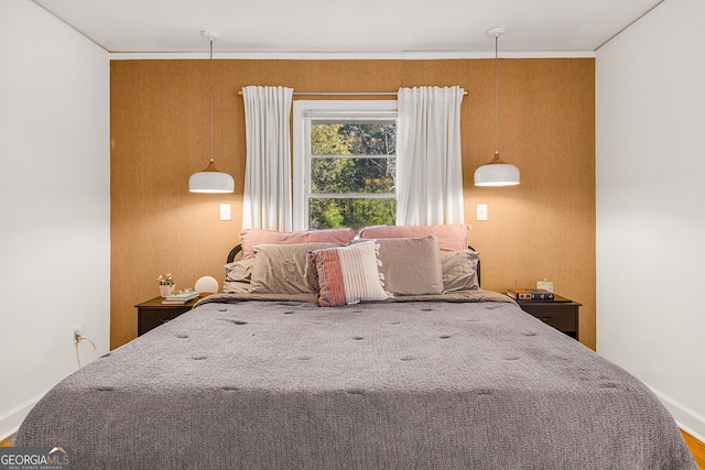 unfurnished bedroom featuring crown molding