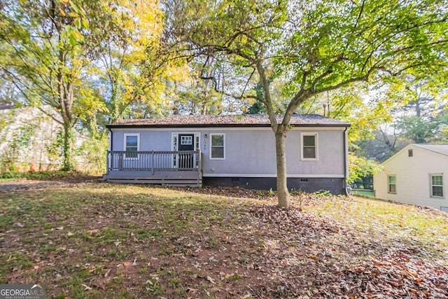 view of front of house with a deck