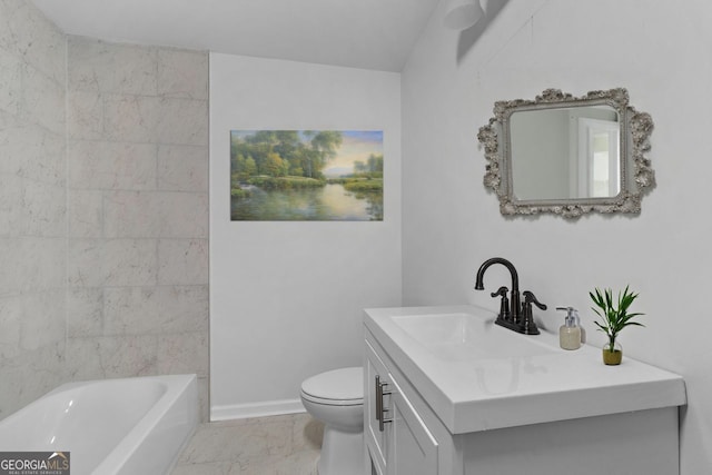 bathroom with vanity, toilet, and a bathing tub