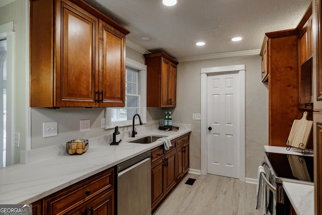 kitchen with ornamental molding, stainless steel dishwasher, light hardwood / wood-style flooring, light stone counters, and sink