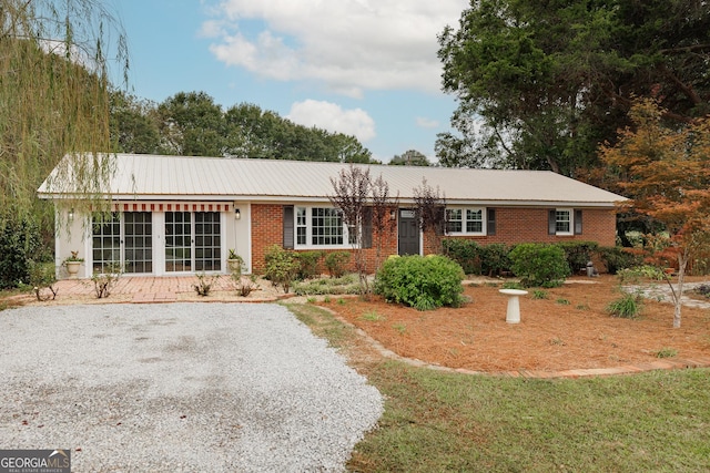 single story home featuring french doors