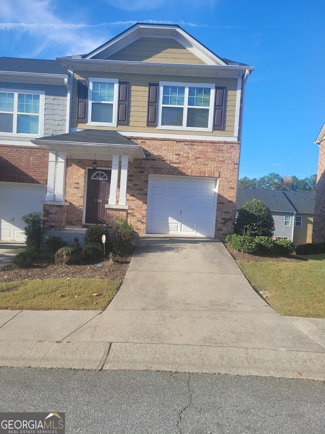 view of front of home with a garage