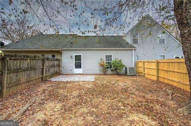 back of house with cooling unit