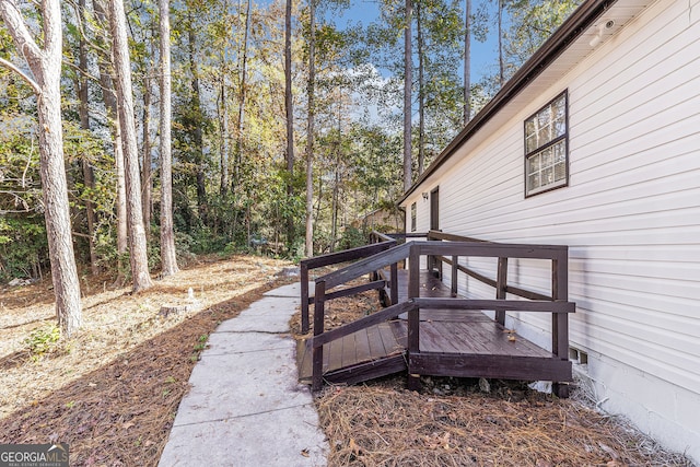 view of yard featuring a wooden deck