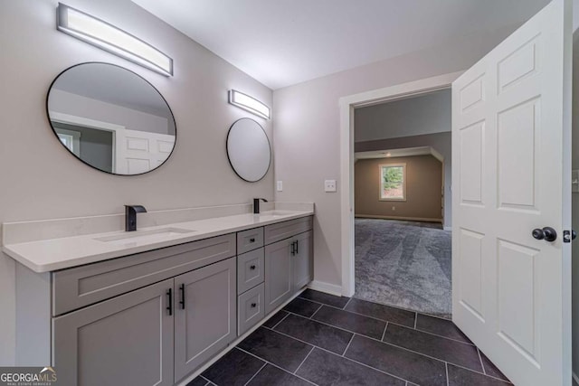 bathroom with vanity and tile patterned floors