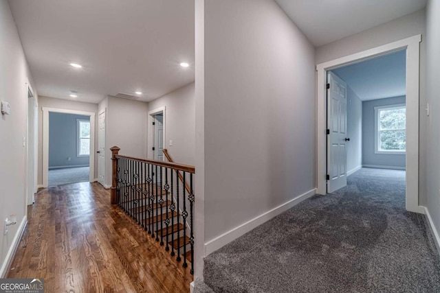 hallway featuring dark wood-type flooring